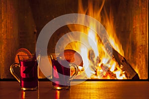 Mulled wine at cozy fireplace firelight only