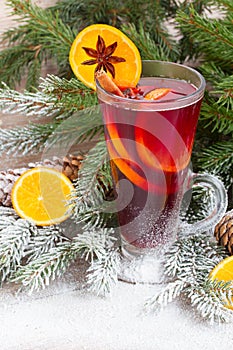 Mulled wine with decorated christmas tree