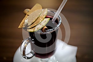 Mulled wine hot drink with apple and cinnamon