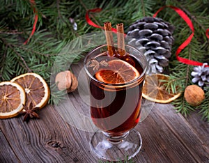 Mulled wine, sliced dried orange, cinnamon sticks