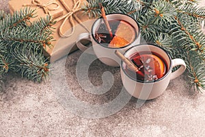 Mulled wine in a small vintage cups with present