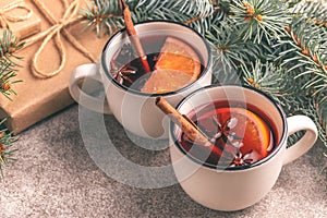 Mulled wine in a small vintage cups with present