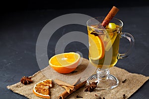 Mulled wine and spices.Christmas hot white mulled wine in glass