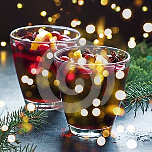 Mulled wine with  spices, cranberry and orange. Christmas composition