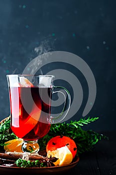 Mulled wine, tree branch and spices