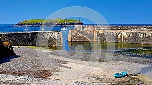 Picturesque Mullion harbour in Cornwall photo