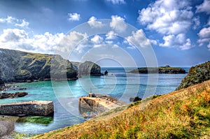 Mullion Cove harbour Lizard peninsula south Cornwall UK in colourful bright HDR
