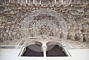 Mullion window and ornate ceiling