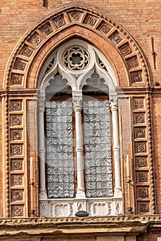 Mullioned window - Accursio Palace in Bologna Italy