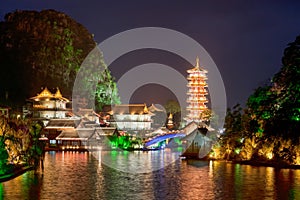 Mulong Pagoda reflected in the Mulong Lake, Guilin, China