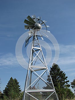 Multi-bladed steel windmill photo