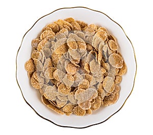 Multi cereal flakes in glass bowl isolated on white