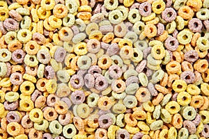 Multi color breakfast round cereal food background.