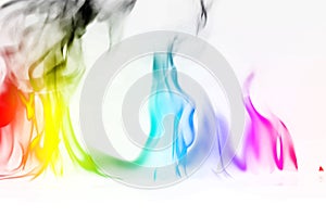 Multi Color Fire Flame Abstract on white background. A mystic colorful smoke. Blurry bright abstraction with colored lines. Magic