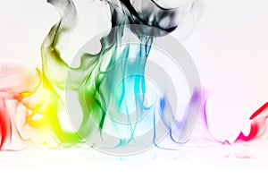 Multi Color Fire Flame Abstract on white background. A mystic colorful smoke. Blurry bright abstraction with colored lines. Magic