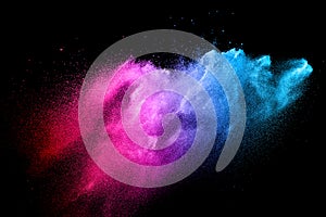 Multi color powder explosion  on black background