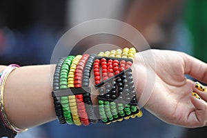 The multi-color verity of Hard end Bangle in hand