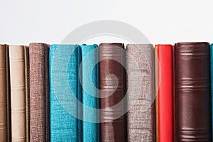 Multi-colored albums of different sizes and textures