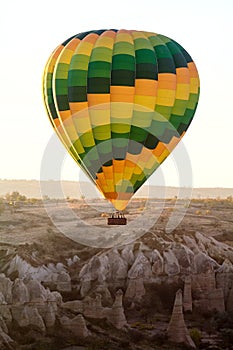 Multi-colored balloon in the air