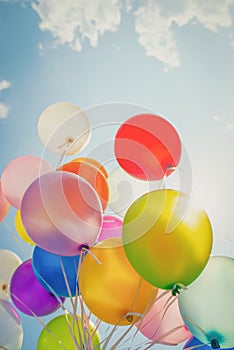 multi colored balloons done with a retro vintage filter effect