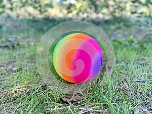 Multi colored beach ball on playground