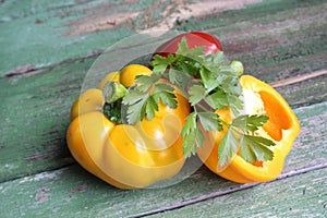 Multi-colored bell peppers on the background of boards