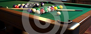 multi-colored billiard balls table cues