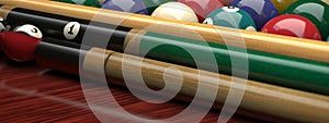 multi-colored billiard balls table cues
