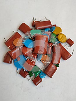 Multi colored bipolar ceramic capacitors dismantled from boards