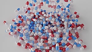 Multi colored capsules falling on a white background 3D rendering stock footage.