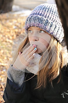 Multi-colored children`s pastel manicure.Winter nails.