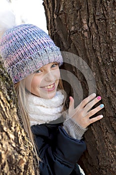 Multi-colored children`s pastel manicure.Winter nails.