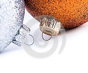 Multi colored christmas balls on white background.