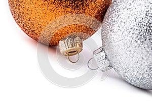 Multi colored christmas balls on white background.