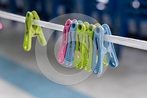 Multi-colored clips on the rope