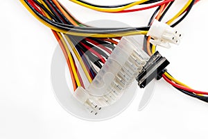 Multi-colored computer wires on a white background