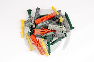 Multi-colored dowels on a white background