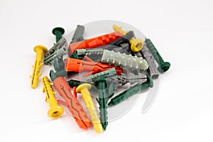 Multi-colored dowels on a white background