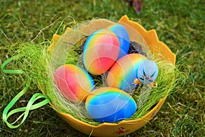 Multi colored Easter eggs in a bowl