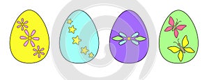 Multi-colored Easter eggs with drawings - set for Easter. Easter eggs of yellow, green, gray, blue colors with the image of butter