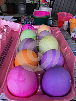 Multi-Colored Easter Eggs in an Egg Carton