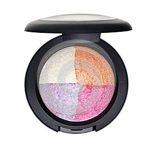Multi colored eye shadows in black round casket isolated on white