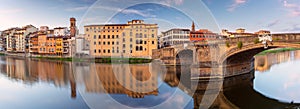 Old stone houses on the banks of the Arno river Florence early in the morning.