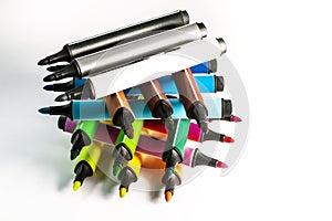 Multi-colored felt-tip pens on a white background. Tools for drawing and creativity. Bright colors. School supplies. opy space