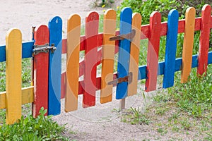 Multi-colored fence strips and wickets