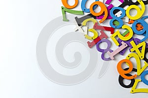 Multi-colored figures on a white background.