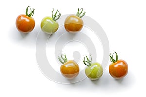 Multi colored cherry tomato isolated on white background