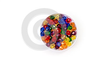 Multi-colored glass beads for beads and bracelets shot large on a white background
