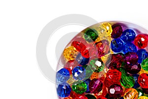 Multi-colored glass beads for beads and bracelets shot large on a white background