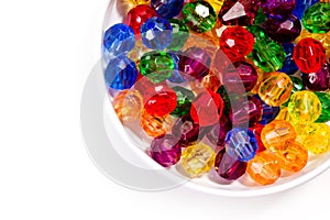 Multi-colored glass beads for beads and bracelets shot large on a white background